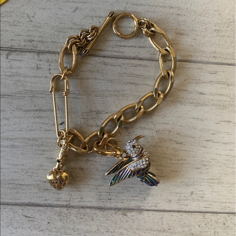Juicy couture charm bracelet with two charms